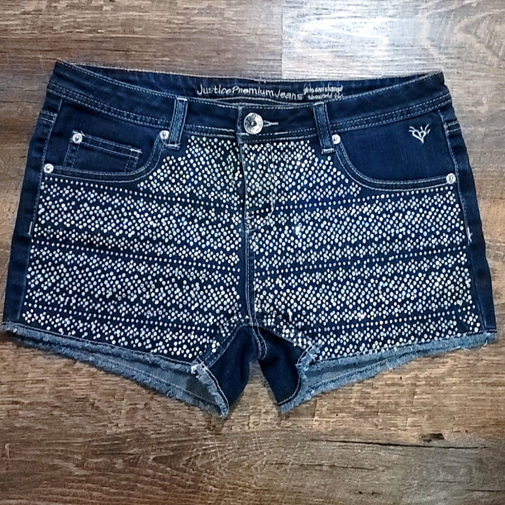 Very gently used Justice jean shorts size 18r Lots of gems on the front sparkly